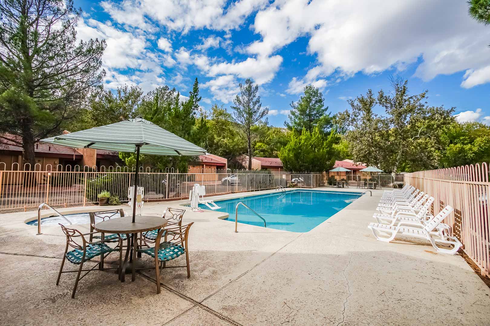A crisp outdoor swimming pool at VRI's Villas at Poco Diablo in Sedona, Arizona.